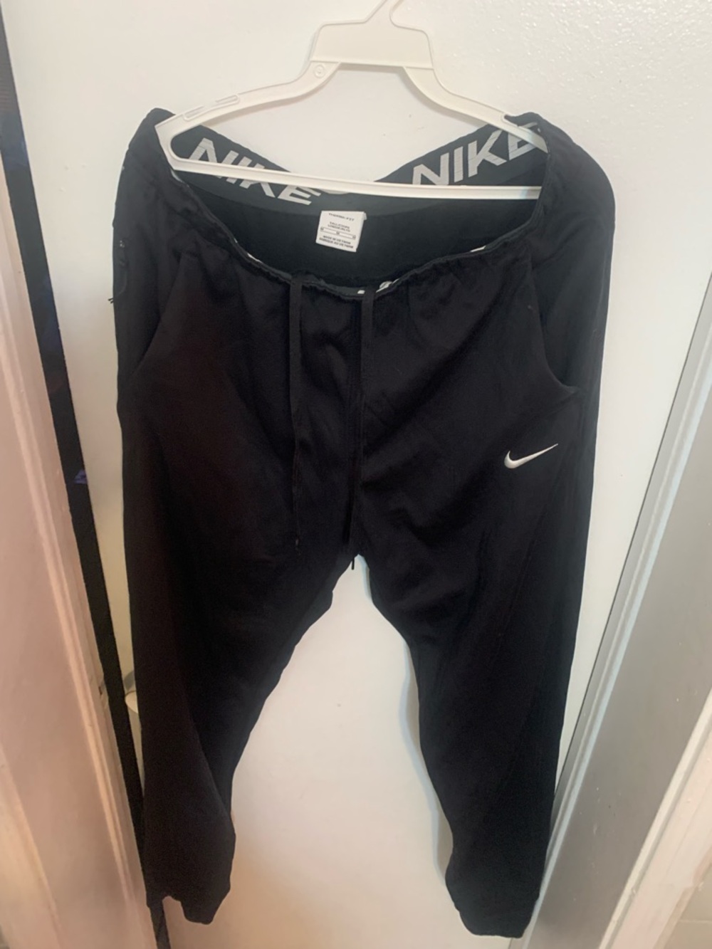 Nike Black Jogger Pants with White Swoosh